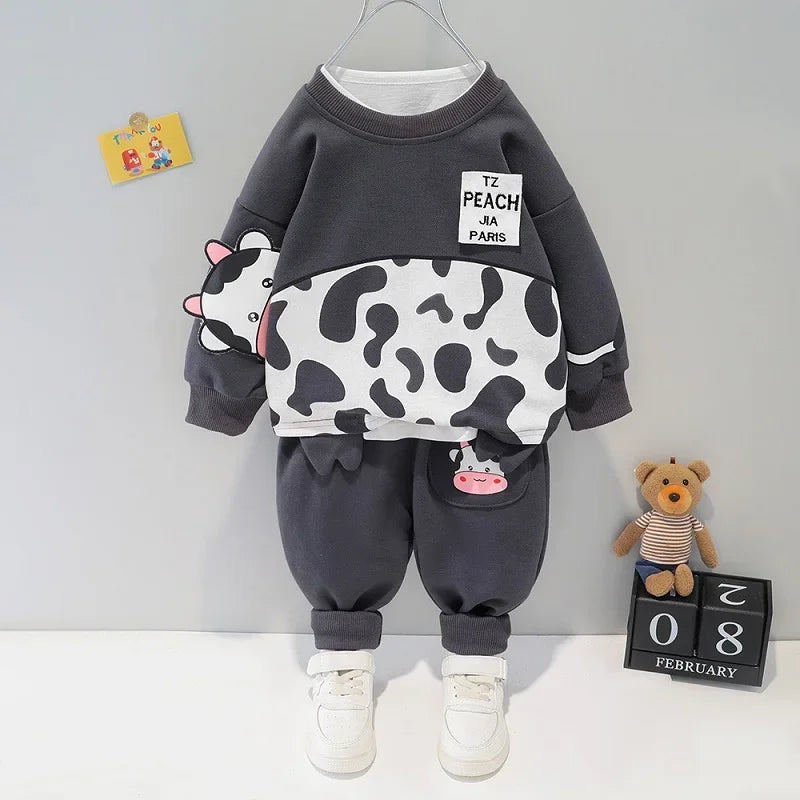 Baby outfit set with MooMoo cow-themed shirt and comfortable pants, ideal for fun everyday adventures.